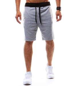 Pantalones cortos de gimnasio personalizados de alta calidad para hombres para fútbol, baloncesto, estilo callejero con bolsillos de patrón sólido ecológicos para deportes - Product Image 1