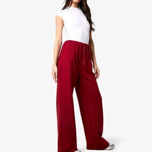 Nuevas llegadas pantalones de chándal de mujer personalizados de color sólido con cordón en la cintura pantalones de chándal de mujer desgastados para la venta diseño OEM - Product Image 1