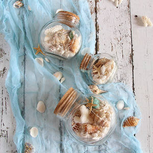 Bouteille en verre décorative de luxe, nouveaux objets de collection, décoration d'intérieur avec des coquillages naturels et du sable - Product Image 3