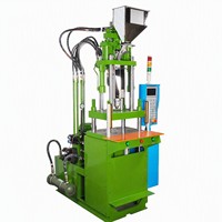 Machine de moulage par injection verticale bicolore HG-TW-120VR pour la production de couvercles de batterie, matériaux ABS/PC/PP/PE/PVC, haute précision