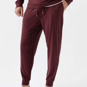 Pantalones de chándal transpirables ligeros de secado rápido de algodón 100% para hombre de talla grande al por mayor, pantalones de chándal de patrón sólido orgánico para invierno - Product Image 2