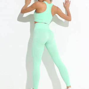 Etiqueta privada en stock Conjunto de yoga para mujer Uso al aire libre Spandex/Nylon Sólido Transpirable Secado rápido Ecológico Conjunto de 2 piezas - Product Image 6
