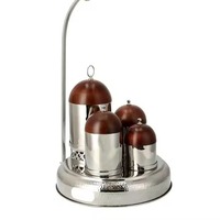 Belle gamme de casseroles arabes en métal avec 3 bols assortis pour conserver les épices, permettant aux cumin, au curcuma et au safran de fleurir magnifiquement