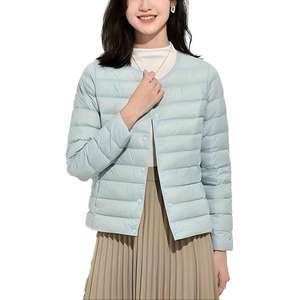 Damesjas met ronde hals en drukknopen, gewatteerde stijl - Product Image 1