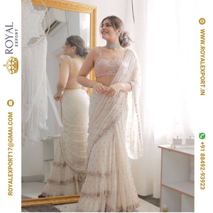 Lanzamiento exclusivo Blissful Party Wear Georgette Ruffle White Sarees Collection Fabricante por Royal Export en Surat Gujarat - Product Image 1