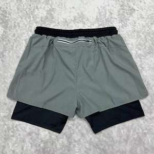 กางเกงขาสั้นออกกำลังกายผู้ชายแบบ 2 in 1 ระบายอากาศได้ดี ผ้าสองชั้น มีกระเป๋า แห้งเร็ว เหมาะสำหรับวิ่ง ฟิตเนส เล่นกีฬา และออกกำลังกายในยิม - Product Image 6