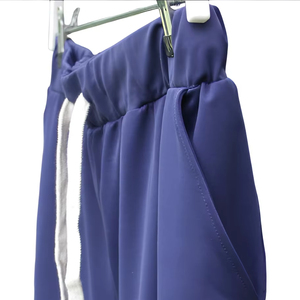 Pantalones de Jogger informales de cintura alta para mujer, elásticos de poliéster de nailon transpirable con tecnología Joan, característica antiarrugas de cuatro vías - Product Image 1