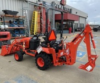 Tracteur Kubota LA340 assez usagé à vendre