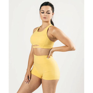 Logotipo personalizado Gimnasio Fitness Entrenamiento Yoga Crop Top Secado rápido Liso Cuello bajo Mujeres Deportes Sujetador de compresión con relleno - Product Image 1