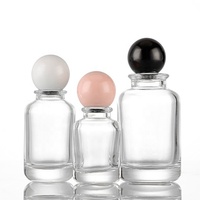 Nouveau flacon de parfum cylindrique en verre 50ml 100ml à fond épais avec sérigraphie, pulvérisateur transparent avec couvercle Wx-47