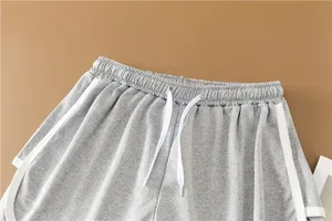 Vente en gros Short de yoga d'entraînement taille haute personnalisé pour femmes Short de motard décontracté avec poches Short à motif respirant pour femmes - Product Image 3