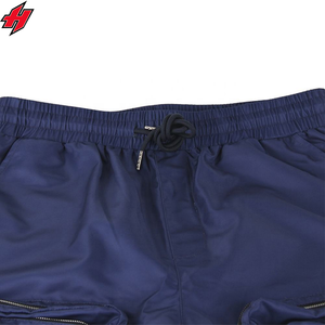 Pantalon coupe-vent de haute qualité avec logo brodé et conception personnalisée Pantalon en nylon en polyester pour hommes Pantalon en nylon à panneaux en bas de vêtements de rue pour hommes - Product Image 2