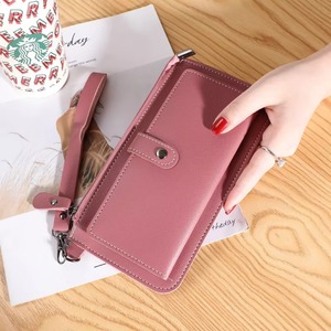 Porte-monnaie multifonctionnel de couleur unie avec carte ouverte Pochette pour femmes Nouveau logo personnalisé pour dames en cuir PU avec pompon mode long Portefeuille - Product Image 1