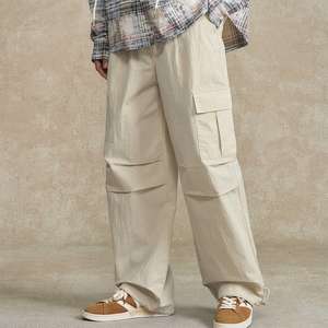Custom <b>Men's</b> Loose Solid Color Polyester Cargo Pants with Double <b>Pleats</b> & Pocket Design Wholesale Spring Autumn Wide Leg Pants - Product Image 2