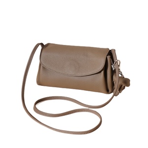 Sac à main de luxe uni avec fermeture éclair pour femme, sac à bandoulière en cuir véritable Litchi haut de gamme pour usage quotidien. - Product Image 1