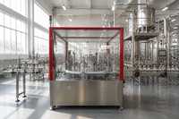 Machine de remplissage automatique de parfum à plateau tournant en acier inoxydable pour la production cosmétique