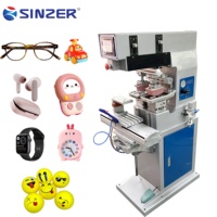 Machine d'impression tampon automatique personnalisée à 2 couleurs avec stabilité accrue pour lunettes, bouchons de bouteilles et jouets en plastique