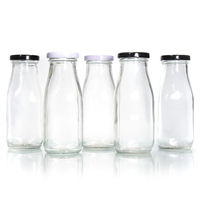 Vente en gros, en stock, bouteilles en verre rond pour lait, boissons, jus, contenants de 1000 ml, 1 L, 32 oz, 1 litre, avec bouchon métallique