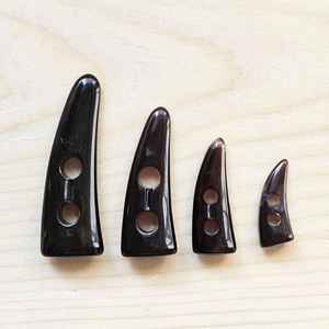 Vente en gros de haute qualité en véritable corne de buffle boutons à bascule en dentelle polie décoration pour jeans manteau vêtements - Product Image 1