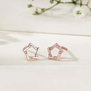 ต่างหูสตาร์ไลท์ สปาร์ค โกลด์ แอนด์ ไดมอนด์ สตั๊ดสำหรับผู้หญิง - Product Image 1
