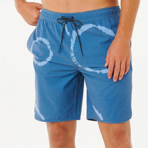 กางเกงขาสั้นชายหาดฤดูร้อนสำหรับผู้ชาย ผ้าโพลีเอสเตอร์ 100% สไตล์เซิร์ฟ ลายเรียบ ผ้าแคนวาสถัก ทรงกลาง บริการขายส่งและรับผลิตแบบ OEM - Product Image 1