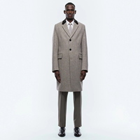 Manteau en laine respirant fabriqué en usine avec motif en chevrons, col tailleur, poches plaquées avec rabats, manteaux longs pour hommes