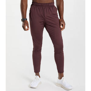 Pantalon de jogging pour homme, dernière collection, couleur rouge, respirant, coupe droite, coton et polyester, léger, style streetwear, broderie. - Product Image 1