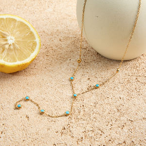 สร้อยข้อมือแฟชั่นทรงกลมประดับเทอร์ควอยซ์สีน้ำเงิน รุ่น J&D Classic ทำจากสแตนเลสสตีลชุบทอง 18K พร้อมสายรูปตัว Y - Product Image 4