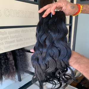 Extensiones de pelo humano indio natural virgen ondulado y liso sin procesar, suministro a granel al por mayor - Product Image 1