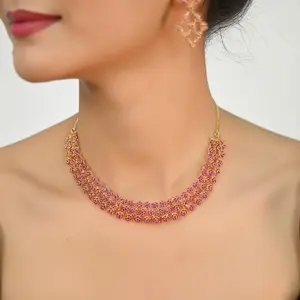 Ожерелье и серьги с красным кристаллом