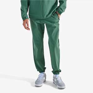 Pantalones de golf personalizados para hombre, joggers con tejido elástico, corte ajustado, transpirables, de secado rápido, para deporte y uso casual. - Product Image 1