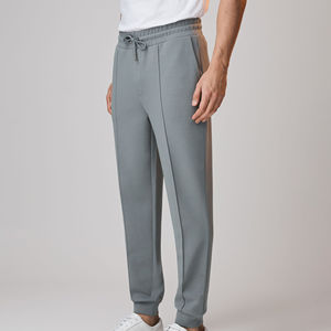 กางเกงวอร์มผ้าฝ้าย 100% ระบายอากาศได้ดี สำหรับผู้ชายและผู้หญิง เอวสูง ทรงตรง ขากว้าง สไตล์สตรีทแวร์ สำหรับแฟชั่นฤดูหนาว - Product Image 1