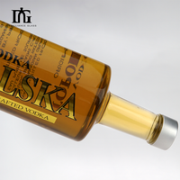Bouteille de vodka en verre dépoli de première qualité de 750ml personnalisée en gros Conteneur de liqueur vide de qualité supérieure avec bouchon à vis