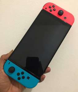 Consola Nintendo Switch 2 de 64 GB y 32 GB OLED con Azul Neón, 100 % en Venta - Product Image 1