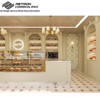 Aménagement intérieur de boulangerie, mobilier sur mesure, présentoir à étages, comptoir de café, comptoir à bonbons et gâteaux, décoration de magasin commercial
