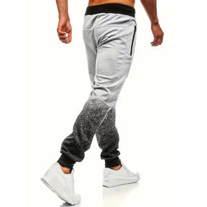 กางเกงจ็อกเกอร์ผู้ชายพิมพ์ลายดิจิทัลตามสั่ง ผ้าโพลีเอสเตอร์ผสมคอตตอน ป้องกันการเกิดขุย รับผลิตแบบ OEM สำหรับชุดกีฬาและชุดฝึกซ้อม - Product Image 2