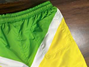 Pantalones cortos cortavientos de nailon sólido con logotipo impreso personalizado para hombre, ropa deportiva para correr de talla grande para Otoño y verano - Product Image 3