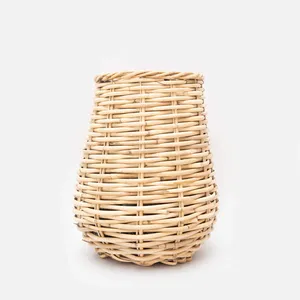 Hanging rattan basket perfect way to mix up your greenery items allows height and natural elements to shine in your space