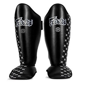 Protections de tibias durables pour Muay Thai et MMA – Protège-tibias en cuir synthétique et mousse haute densité pour le sparring et le combat de kickboxing - Product Image 2