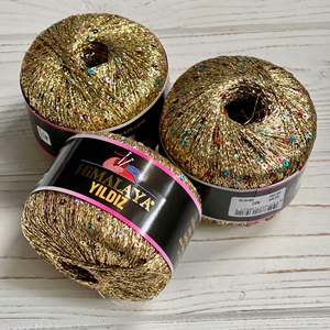 ผลิตภัณฑ์เส้นด้ายแฟนซีสีทอง58104ดาวหิมาลัย - Product Image 1