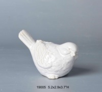 Colombe d'oiseau en céramique blanche d'inspiration vintage avec des détails complexes avec des découpes en treillis Figurine décoration de la maison