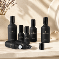 Flacon roll-on en verre fin noir mat anti-reflet pour sérums contour des yeux haute performance et extraits végétaux
