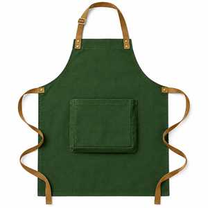 Delantal de algodón azul claro con bolsillo frontal y correas de cuero marrón, lavable a máquina para uso diario en la cocina. - Product Image 6