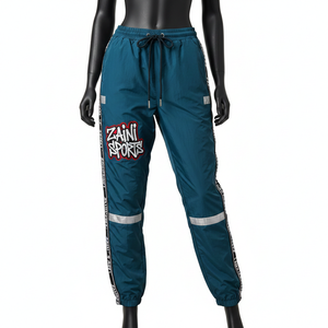 Pantalones Cortavientos para Mujer, Tacto Suave, Tejido de Nailon, Paneles Verde Azulado, Tiras Reflectantes, Logotipo Personalizado Bordado - Product Image 1