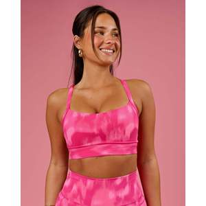 Sujetador deportivo transpirable y ajustable Momentum para mujer, talla D/DD/E, estampado rosa radiante - Product Image 1