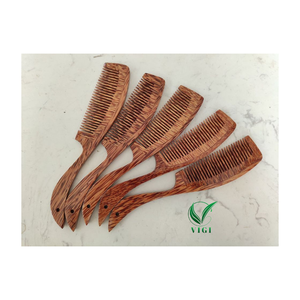 Desbloquea la belleza de la naturaleza: peines de madera de coco hechos a mano vietnamitas para un cabello más fuerte, saludable y sedoso - Product Image 1