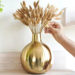 แท่นโชว์ดอกไม้โลหะหรูหราสำหรับตกแต่งบ้านที่ทันสมัยและตกแต่งโต๊ะด้วยลวดลายดอกไม้ - Product Image 1