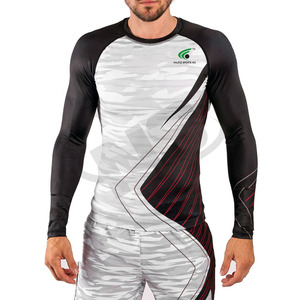 Logo personnalisé Rash Guard pour hommes à manches courtes coupe athlétique haut d'entraînement de combat vêtements légers conçu avec Jiu Jitsu Kimono Style - Product Image 1