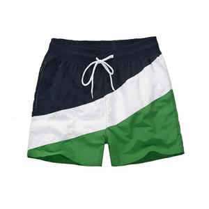 Light Men Gym Shorts Logotipo personalizado Blanco y verde fluorescente Pantalones cortos para correr - Product Image 6