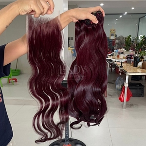 Paquetes de color de punta ondulada corporal de cabello crudo de alta calidad y cierre para hacer pelucas de cabello vietnamita real - Product Image 2